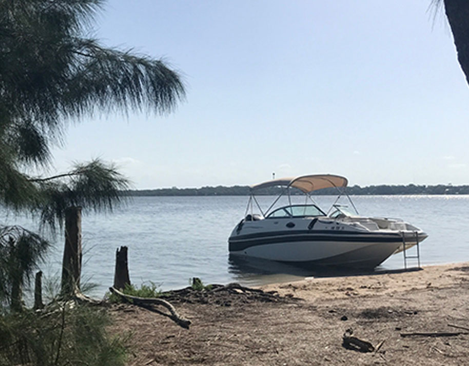 new boat beached on an island