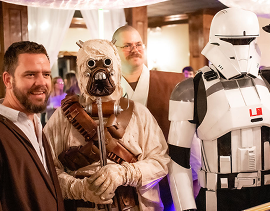 Attendees of the Galatctic Fundraiser dressed up in Star Wars Costumes
